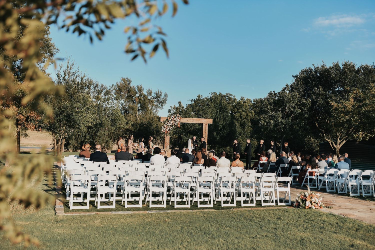 Romantic outdoor ceremony at a rustic Texas ranch wedding