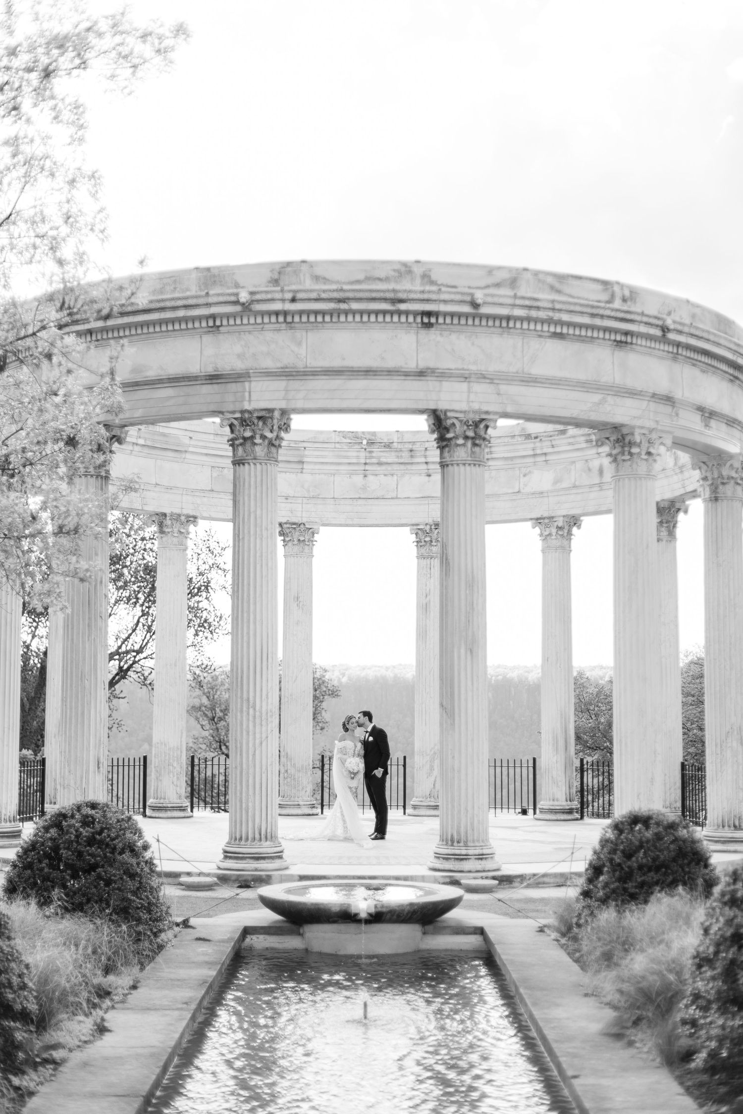 Artistic black and white close-up photo showing wedding day details and crystal accessories.