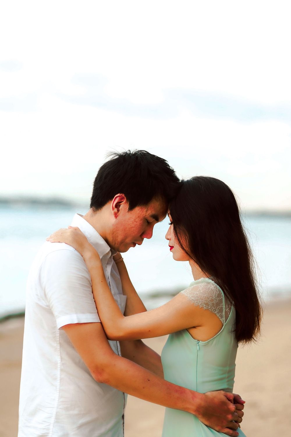 Engagement prewedding shoot of a couple during an outdoor, nature photoshoot in Singapore