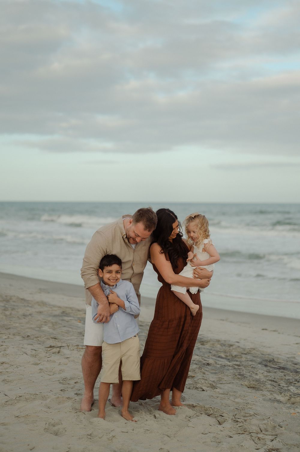 fun candid family photography at Huntington Beach state park in Murrells Inlet, SC