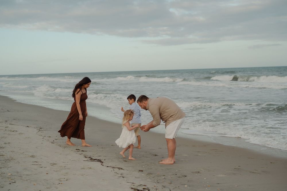 fun candid family photography at Huntington Beach state park in Murrells Inlet, SC