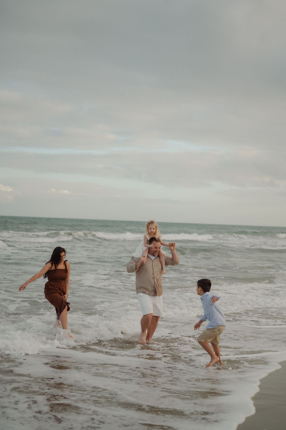 fun candid family photography at Huntington Beach state park in Murrells Inlet, SC