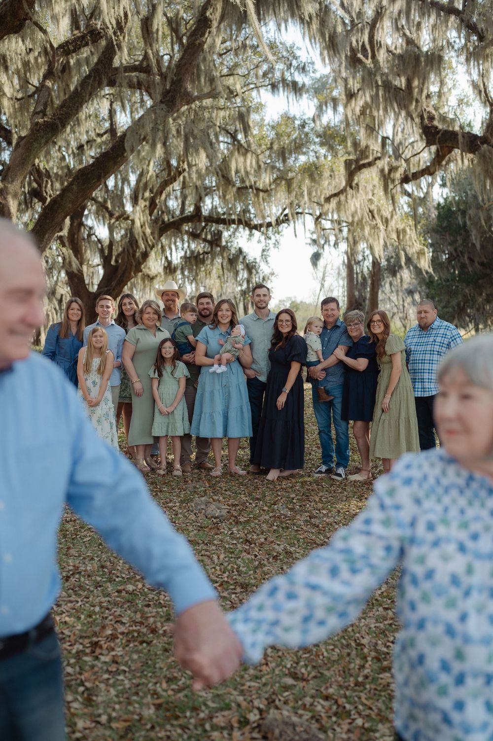 extended family photography session in Georgetown,SC among Spanish moss trees