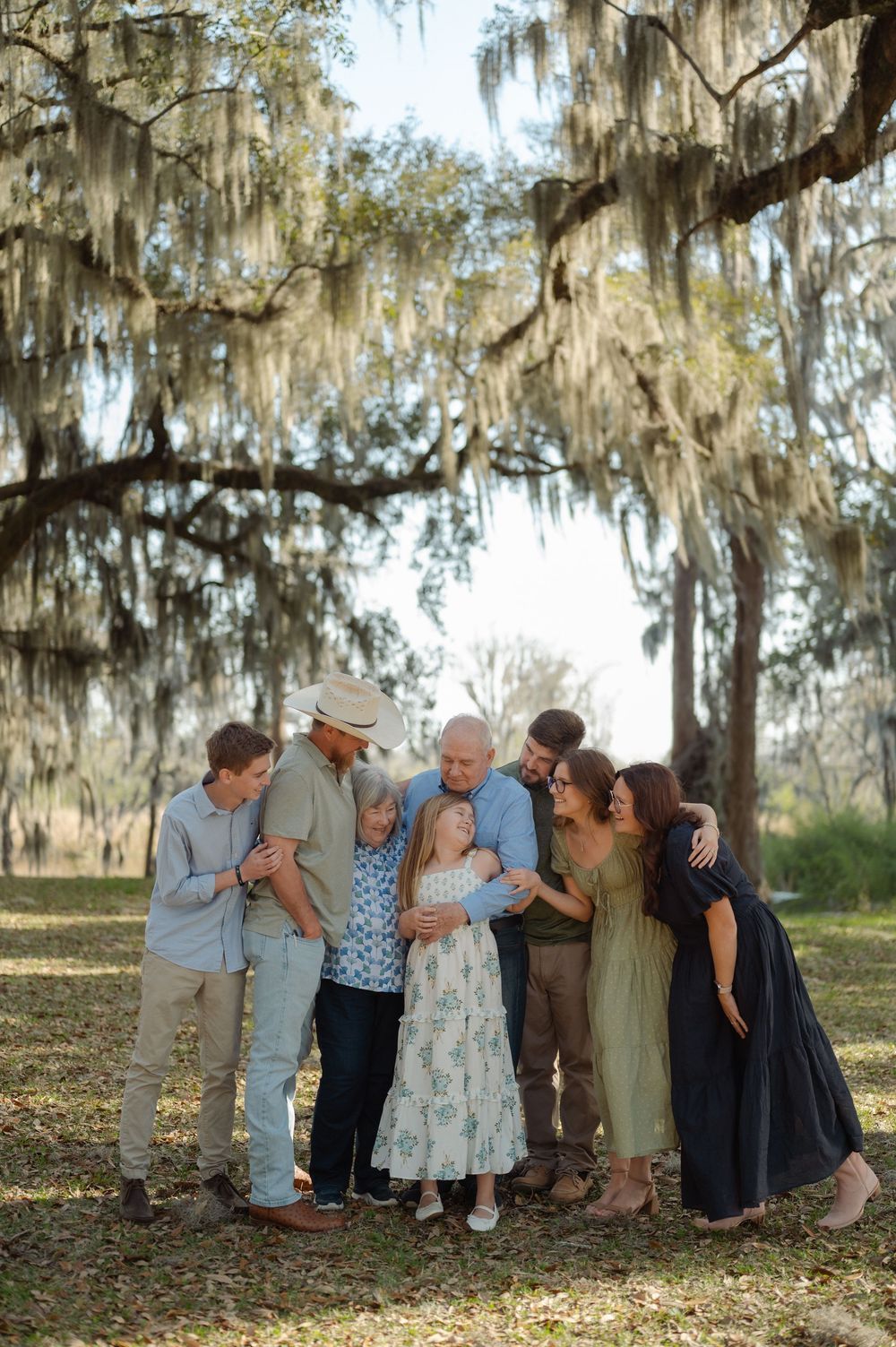 extended family session in Georgetown,SC among Spanish moss trees