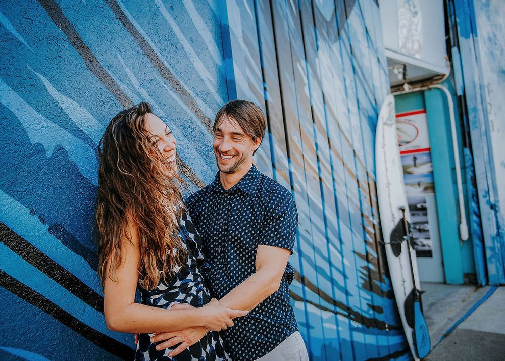 couple laughing and being lovey together