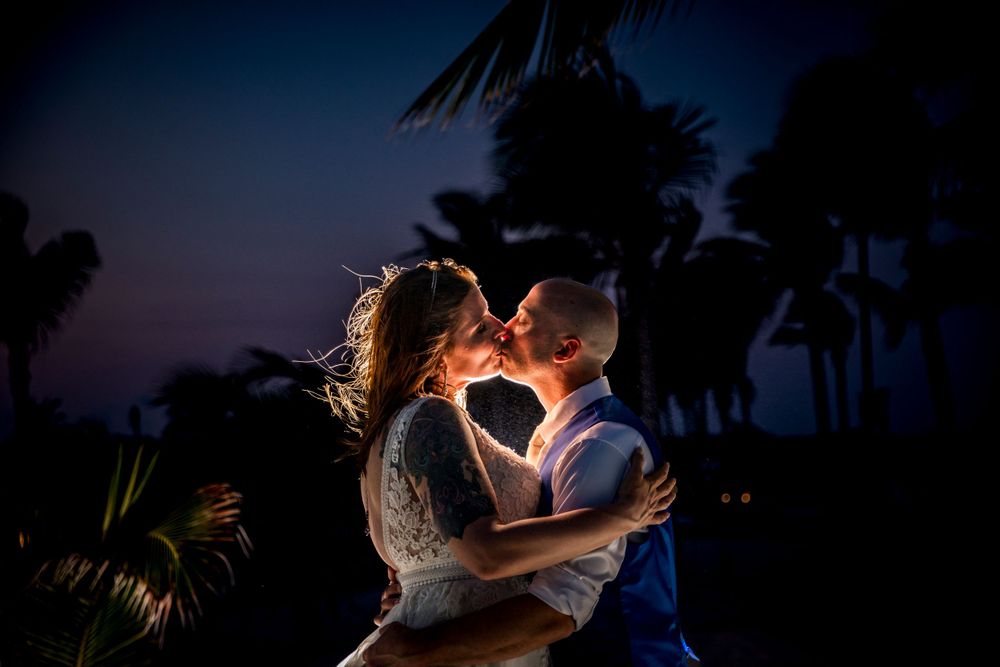 backlighting a a wedding couple