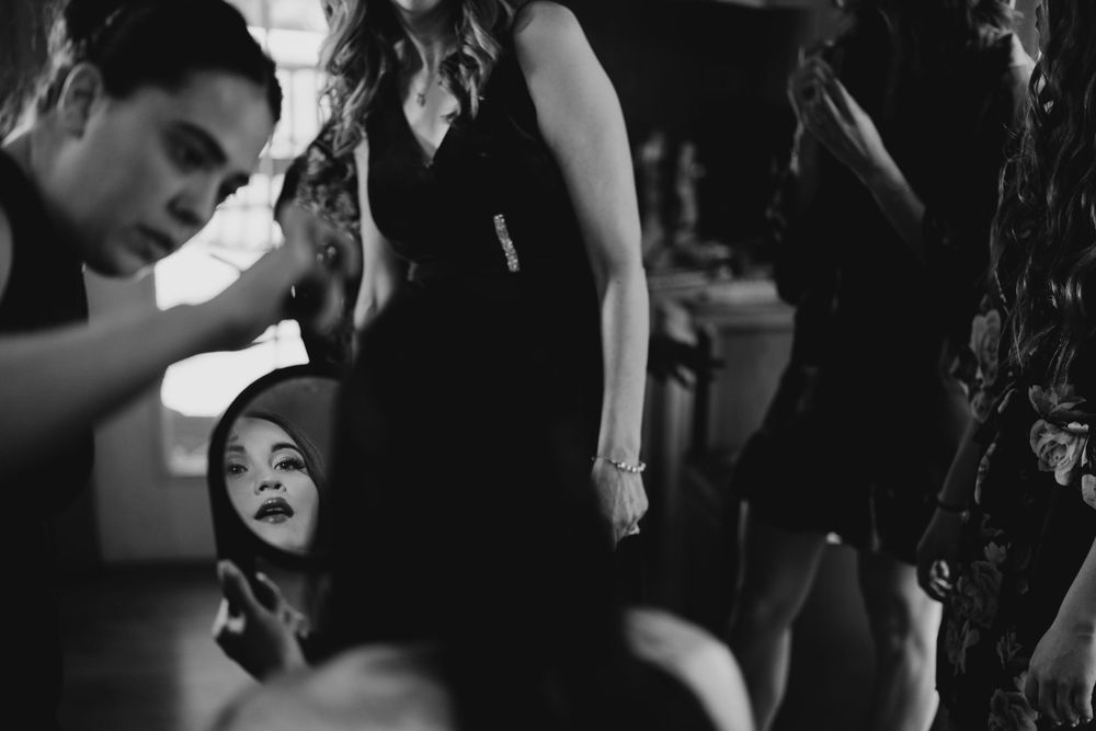 Black and white candid shots of wedding reception dance floor moments.