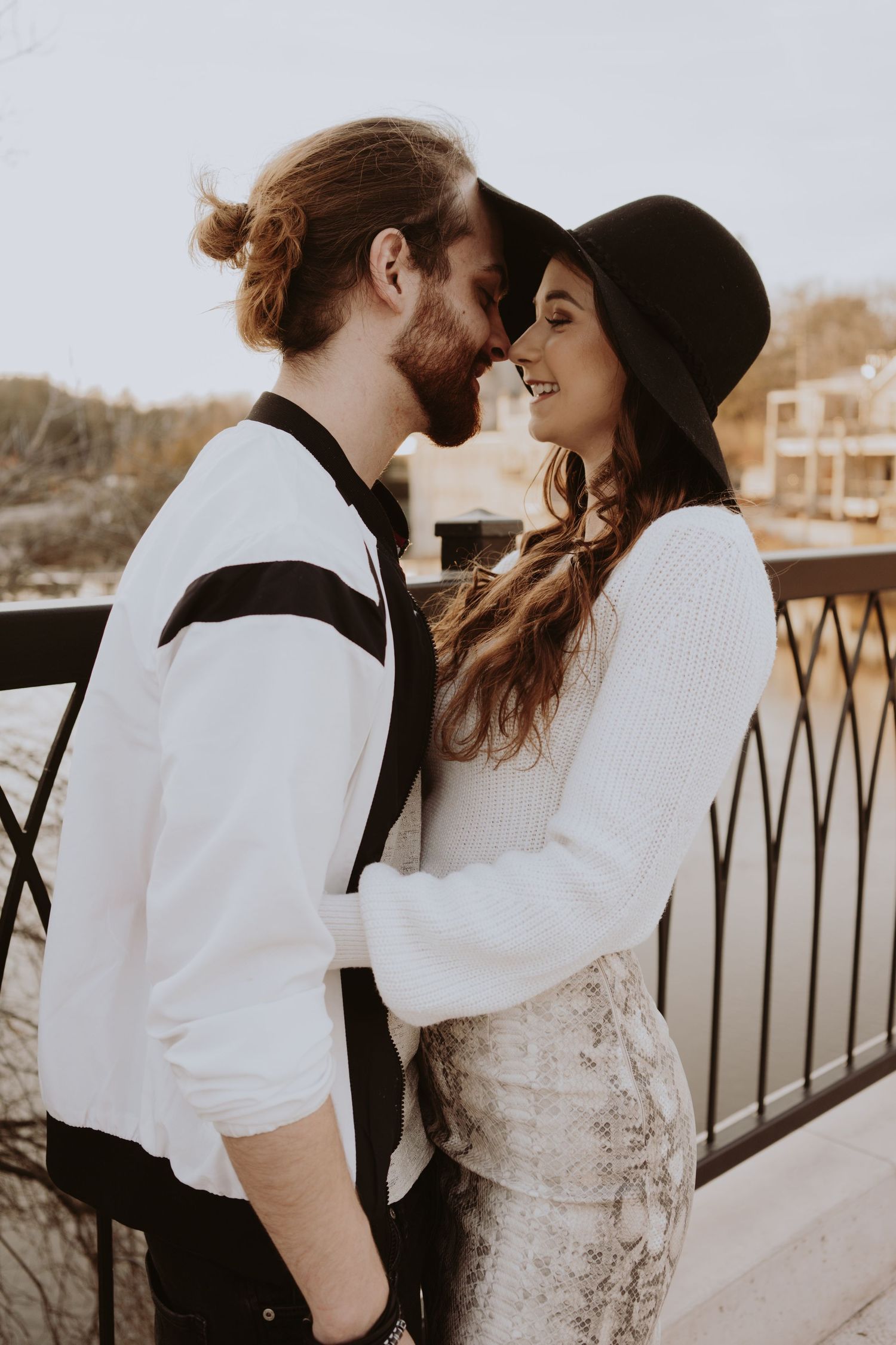 Image of a woman and man smiling at eachother.
