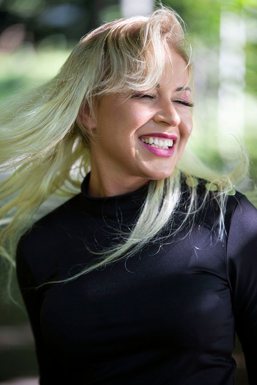 blonde women smiling at the camera