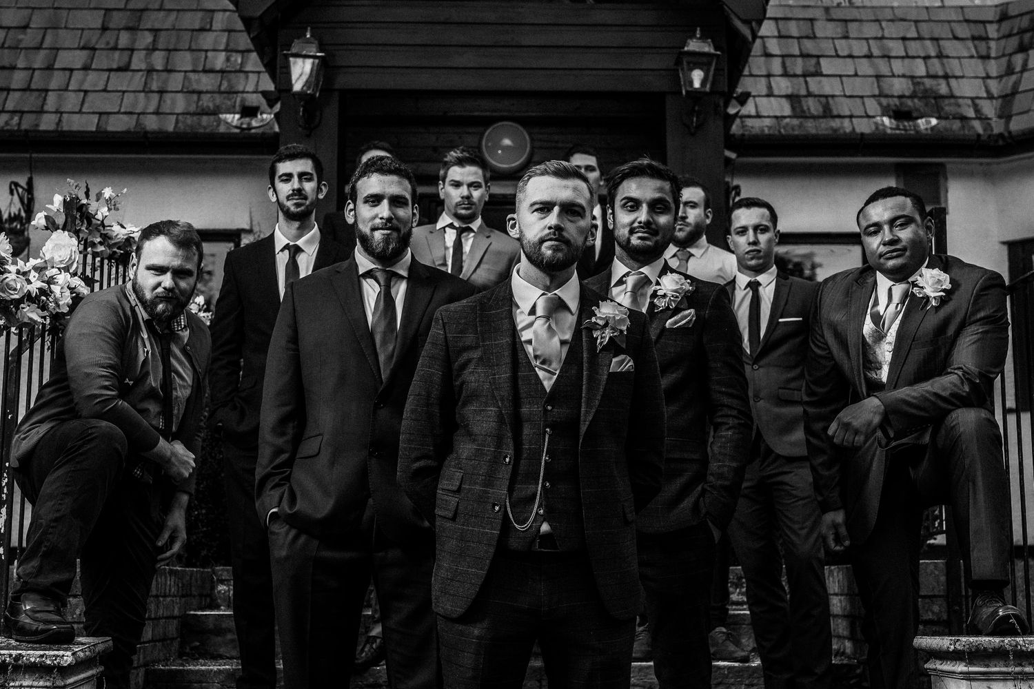 Groom and groomsmen black and white group photo
