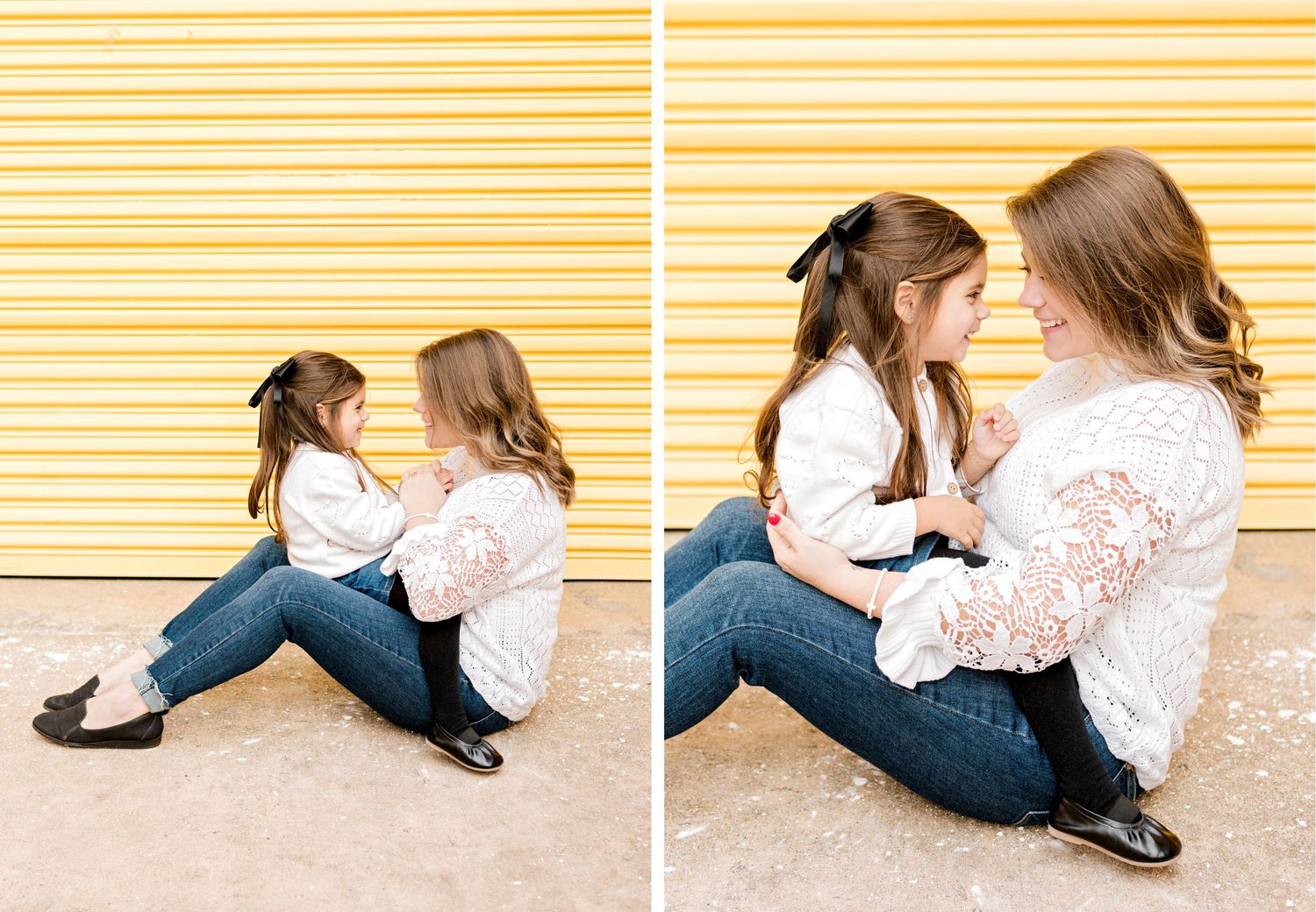 Tender moment shared between two people sitting against yellow striped wall wearing white lace and denim.