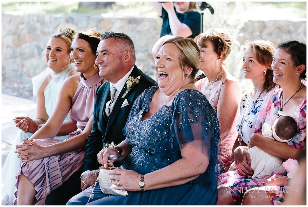 wedding guests laughing