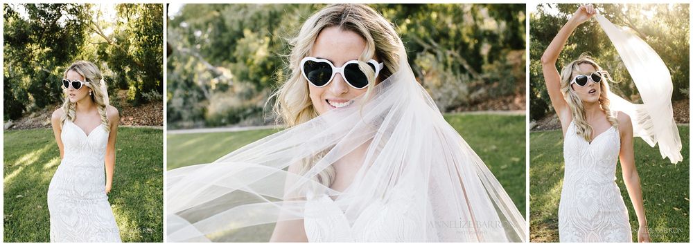 Bride playing with her veil