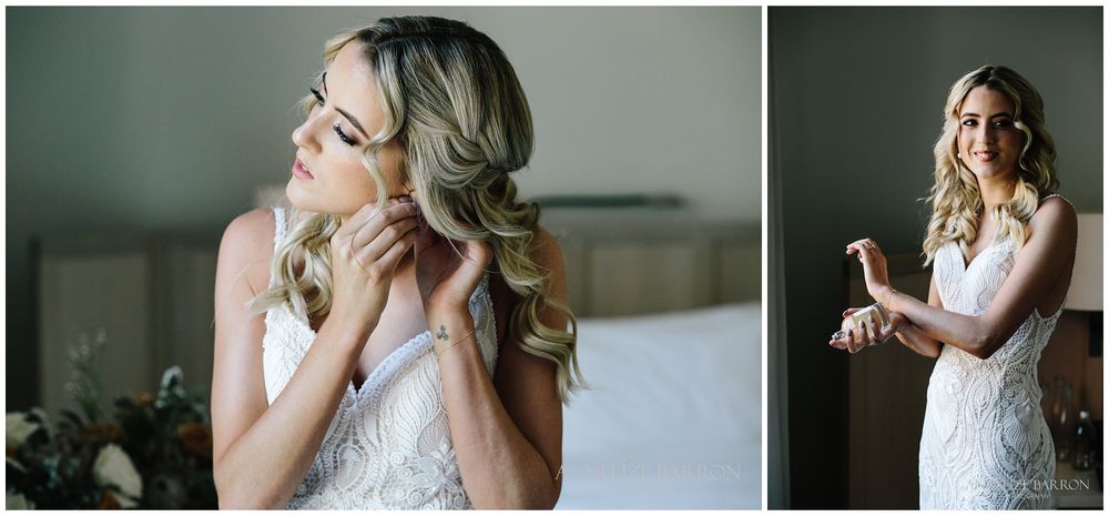 Bride putting on her earrings and perfume for her COMO the Treasury wedding