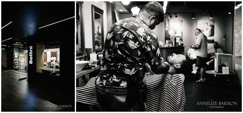Black and white of a barber and the barber getting the groom ready