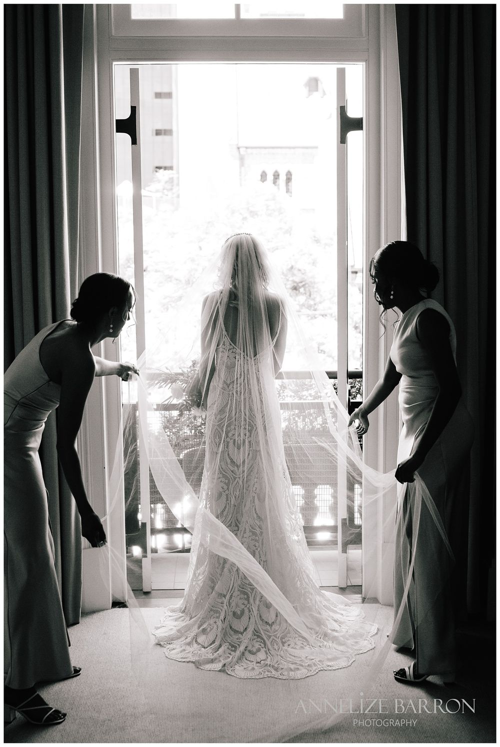 Bride portrait as she is looking out the door before her COMO the Treasury wedding