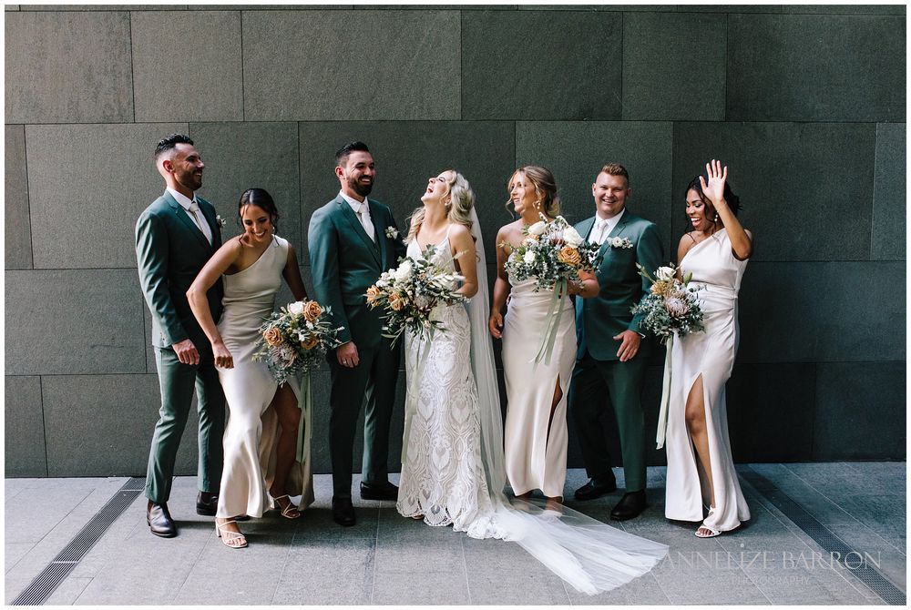 Bridal party having fun at this COMO the Treasury wedding