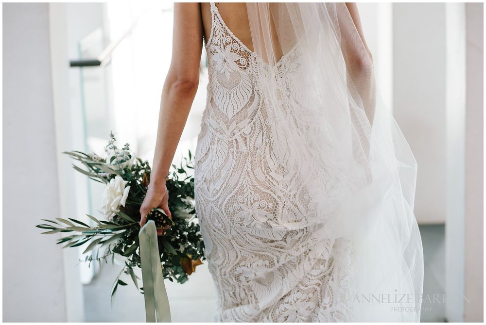closeup detail photo fo the bride walking away