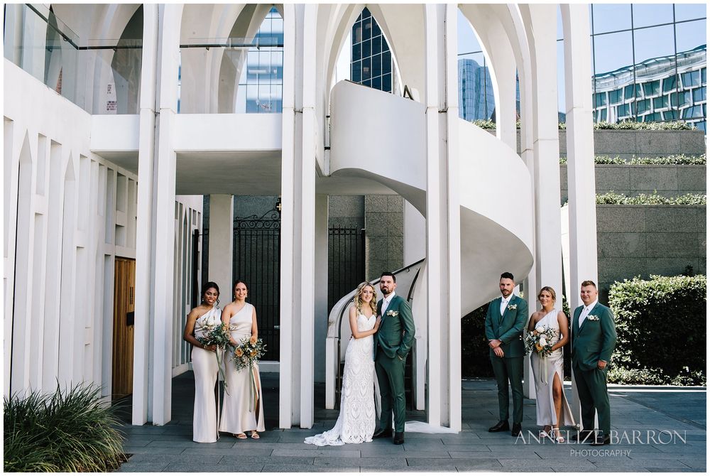 Formal bridal party portrait at this COMO the Treasury wedding