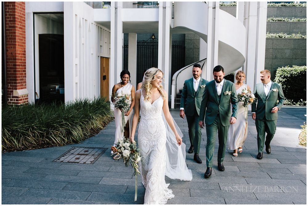 Bridal party walking towards us