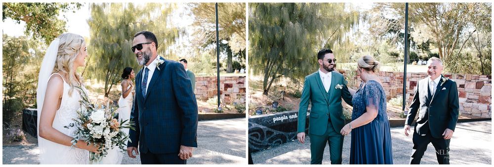 Bride and groom greeting their parents before the ceremony in Kings Park wedding