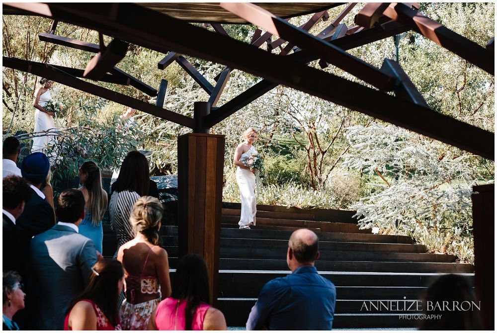 Bridesmaid walking down the stairs at Kings park wedding