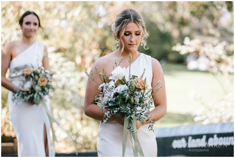 Bridesmaid walking down the stairs at Kings park wedding