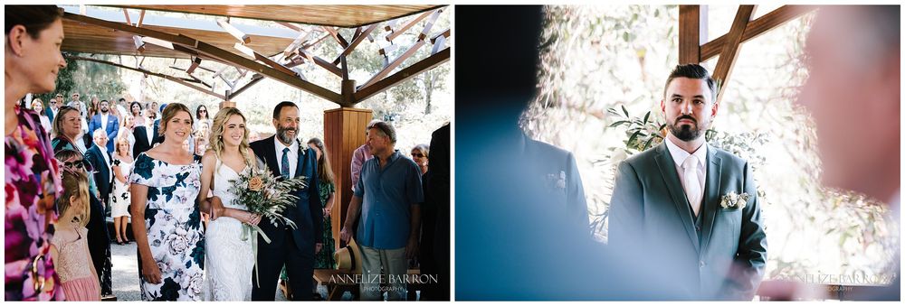 Bride walking down the isle with her parents at this Kings Park wedding