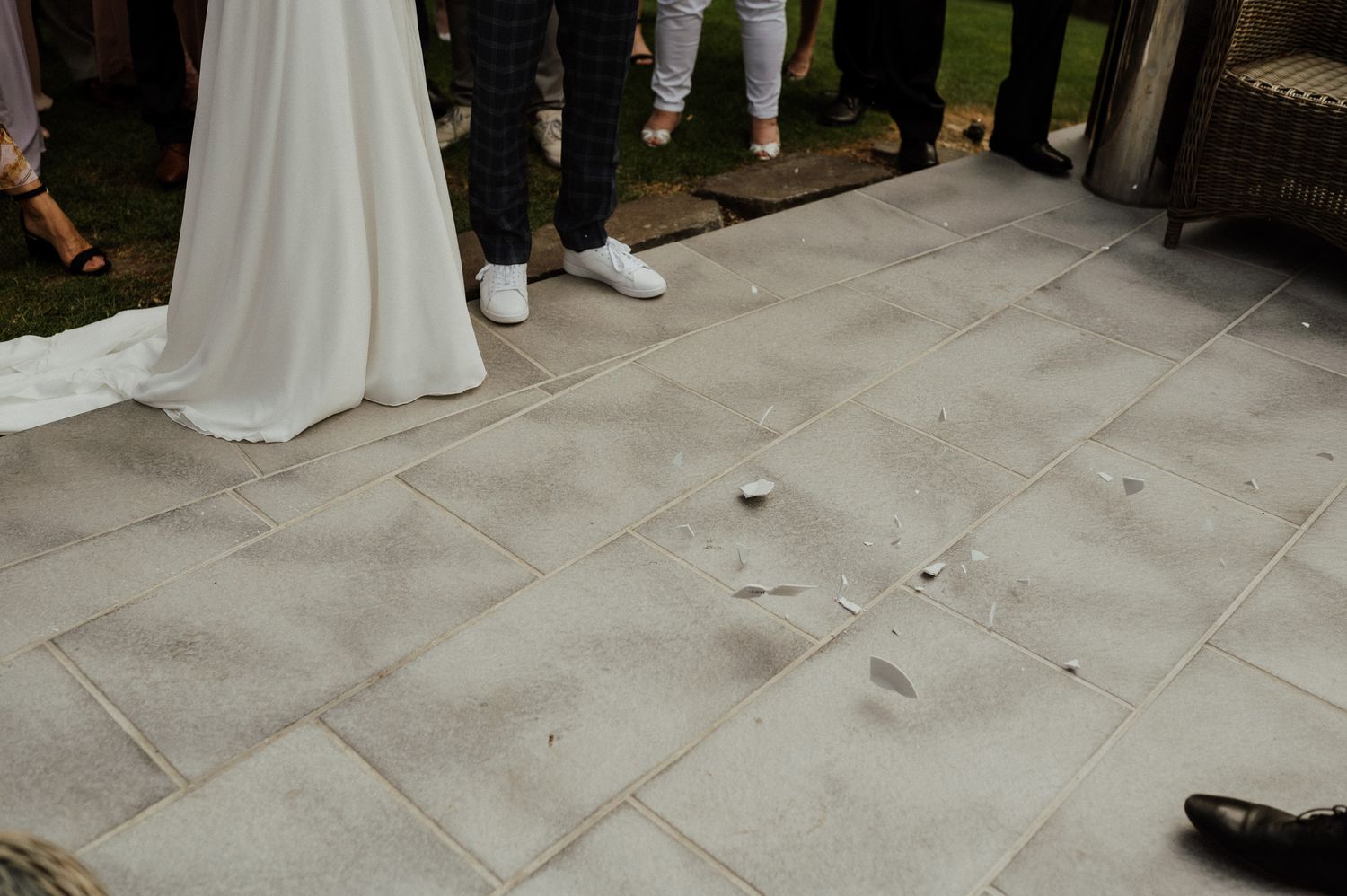 Close up view of stone tile flooring at outdoor wedding venue.