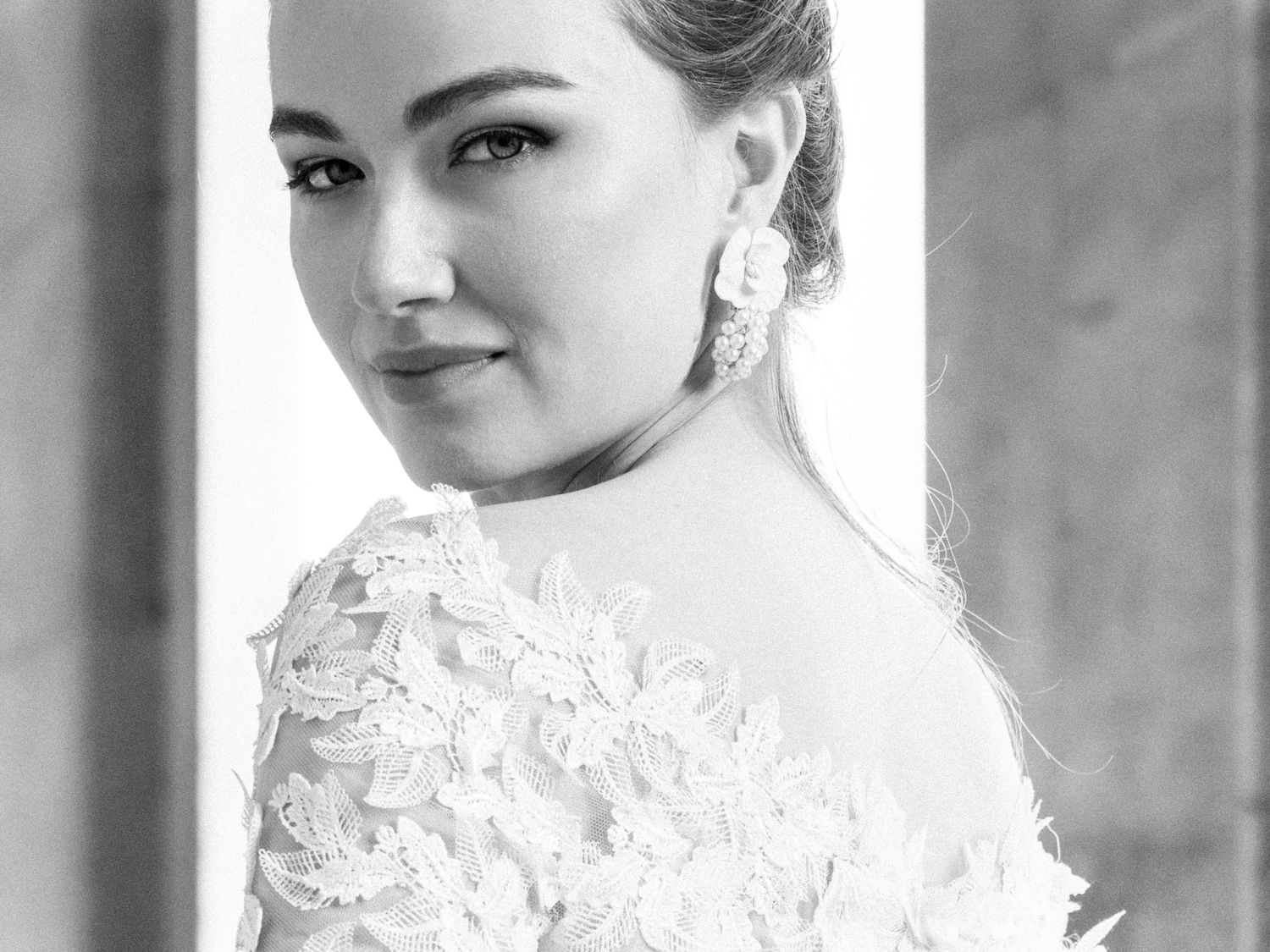 Classic black and white bridal portrait showcasing intricate lace details.