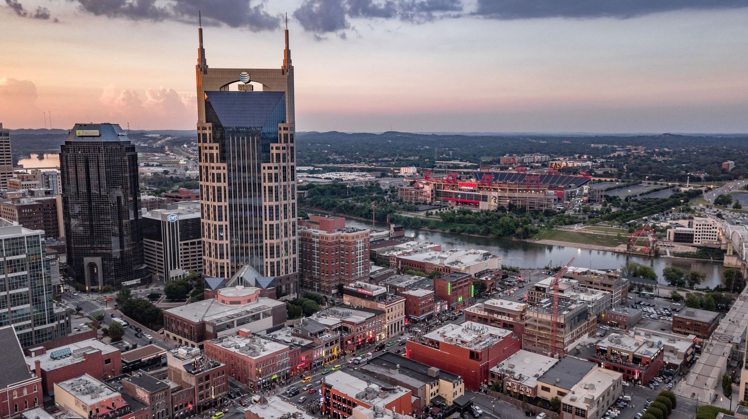 Aerial view of downtown Louisville's historic buildings and modern skyscrapers.