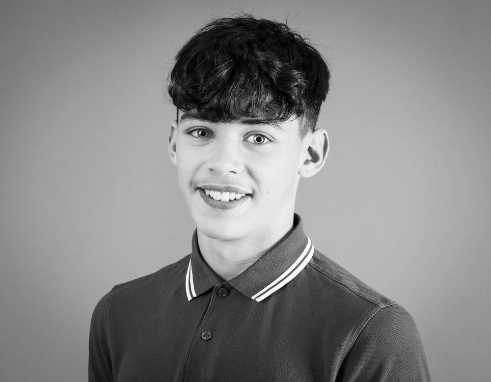 Black and White headshot. Teenage boy.