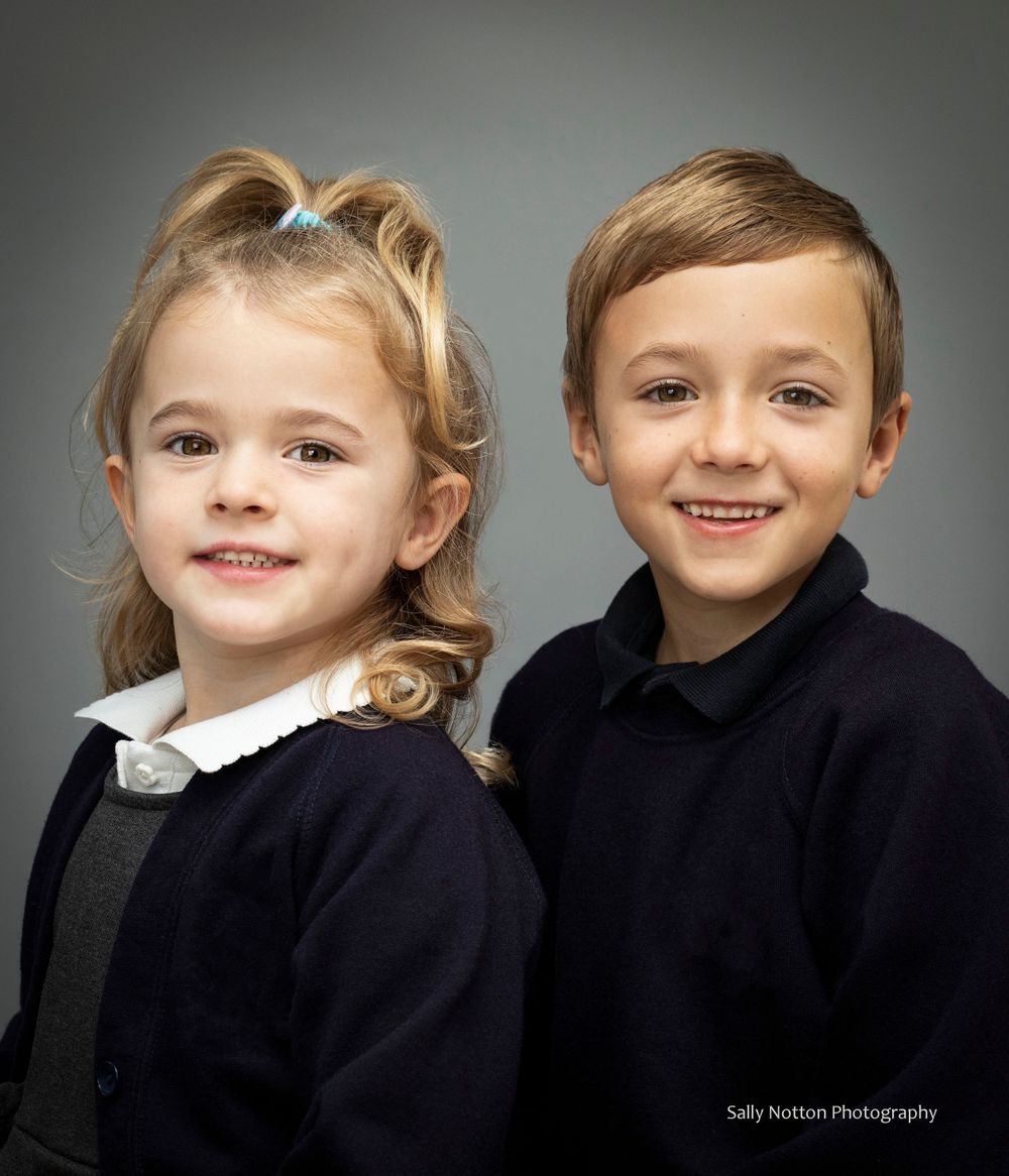 Brother and sister school headshot.