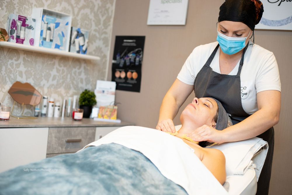 Beautician applying massage.