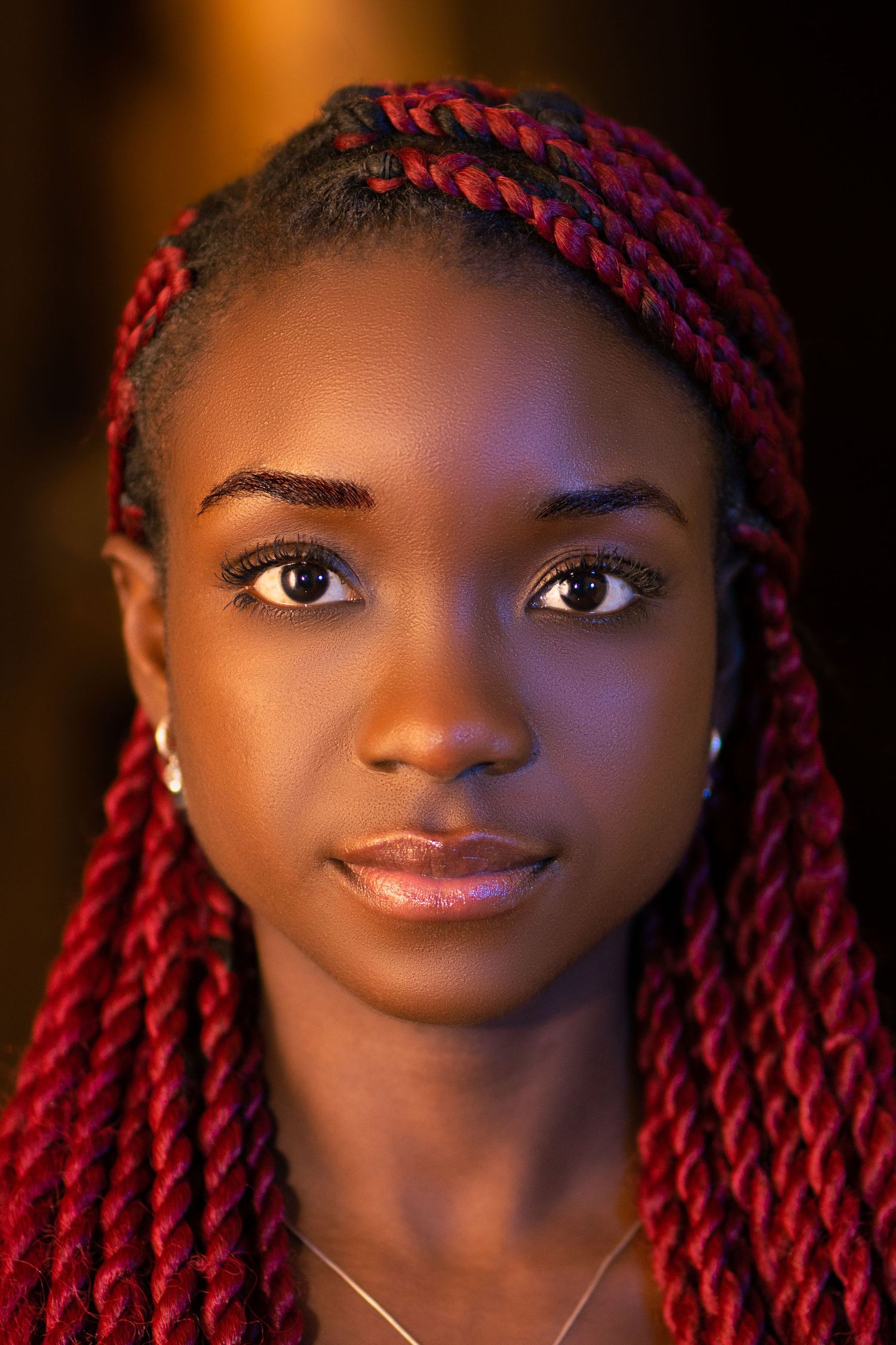 Black model Juldeh Johnson photoshoot in London Red Braids portraiture by Kush Rattan Photography