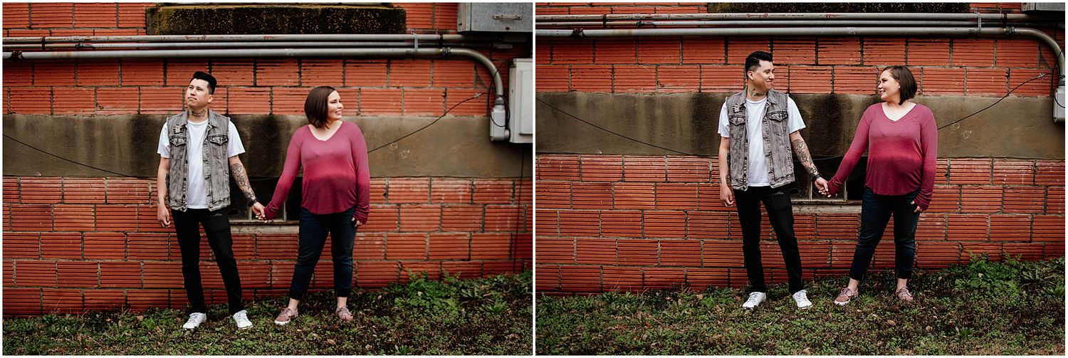 Couple posing against red brick wall in casual outfits in two similar shots taken outdoors.