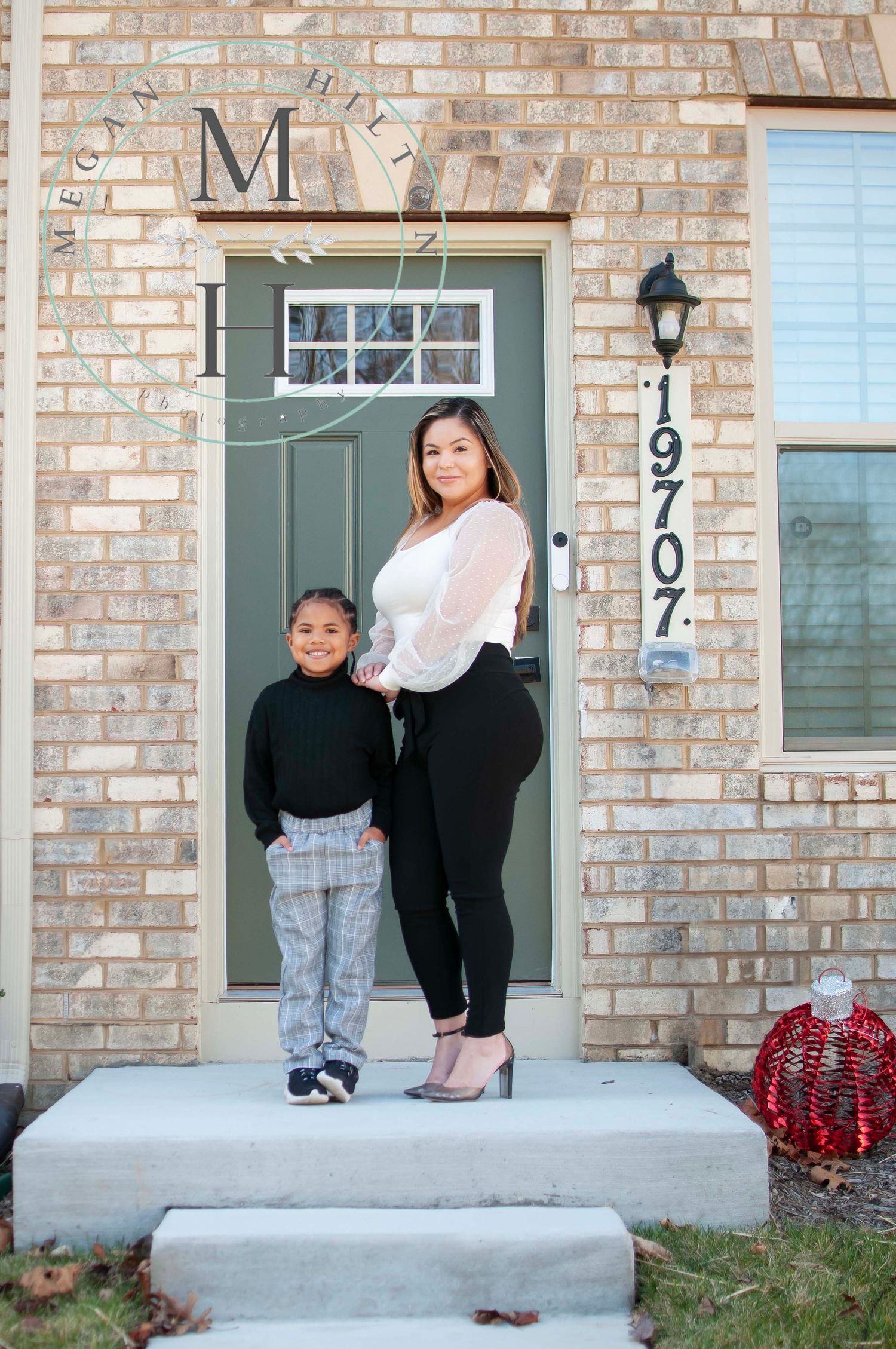 Family outside new home