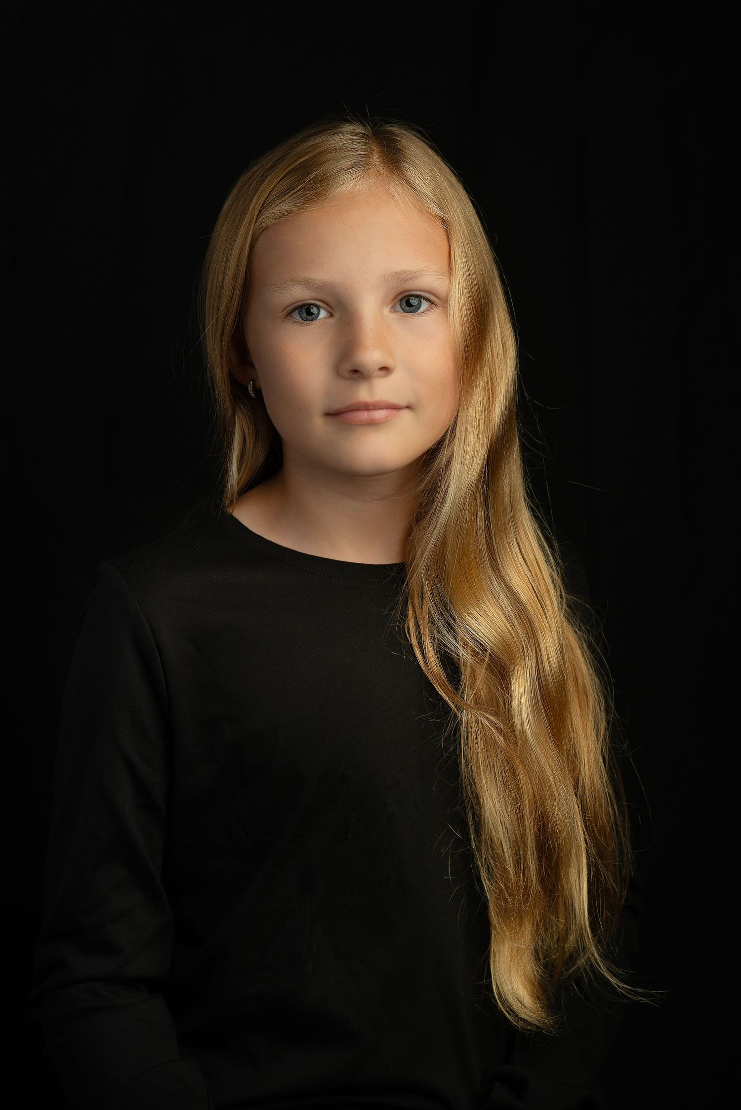 timeless portrait of girl on black background