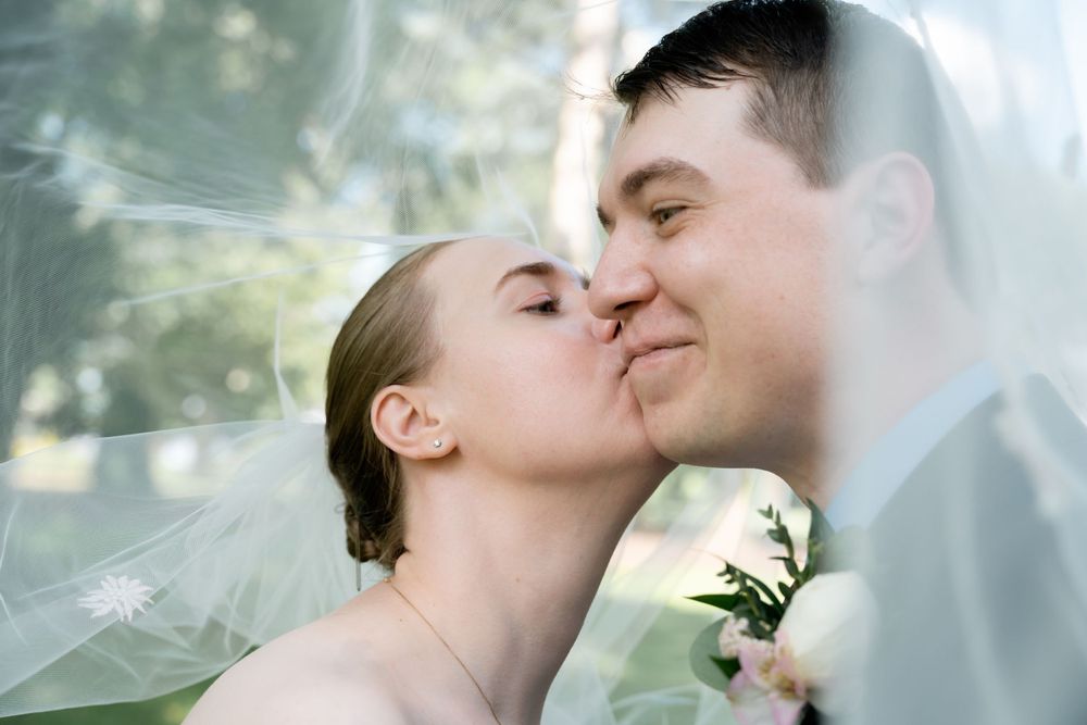 Outdoor elopement photography session with couples under veil wearing near Charlottesville, Virginia