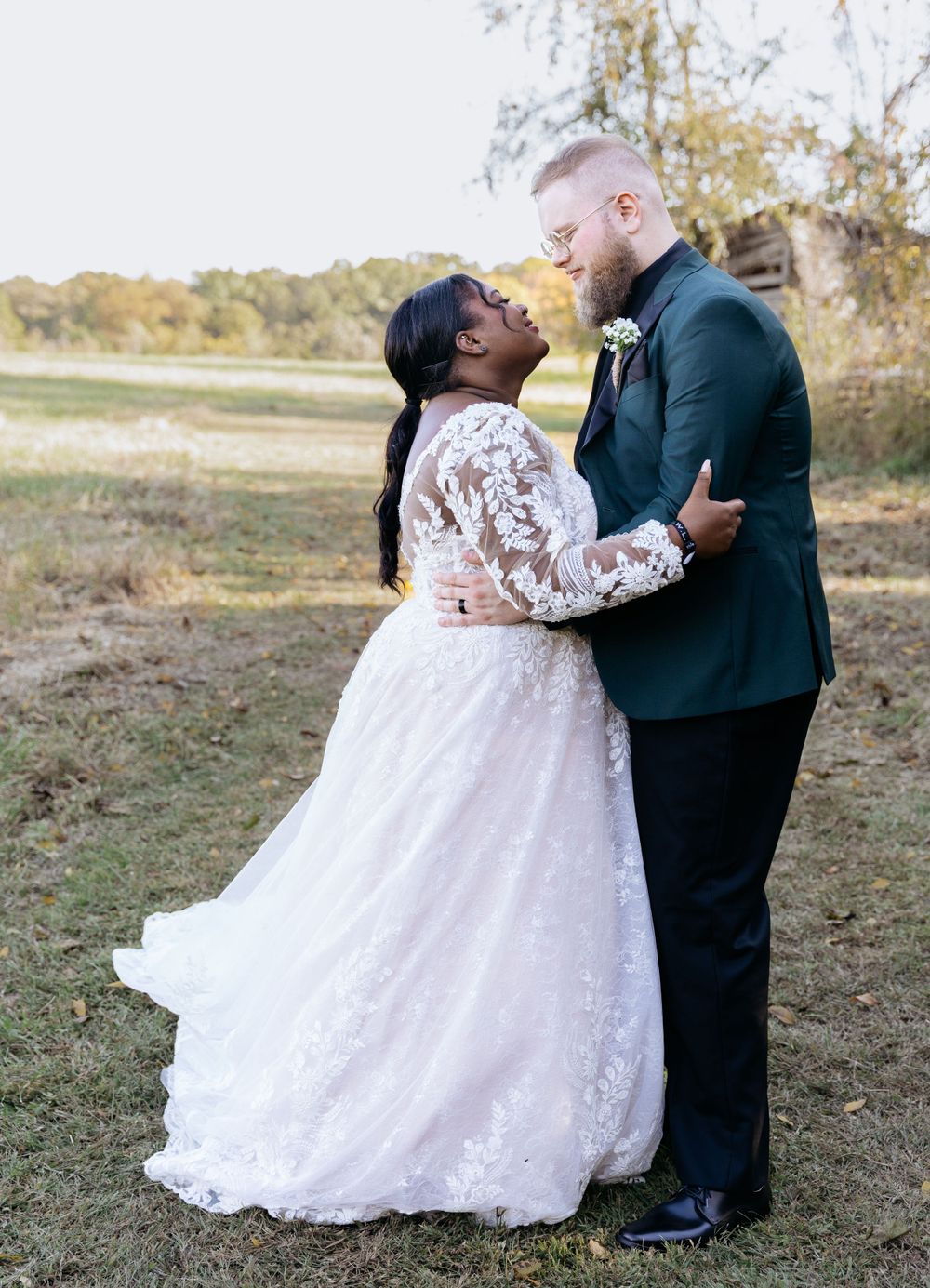 Outdoor wedding photography with couples individual photoshoot holding each other.