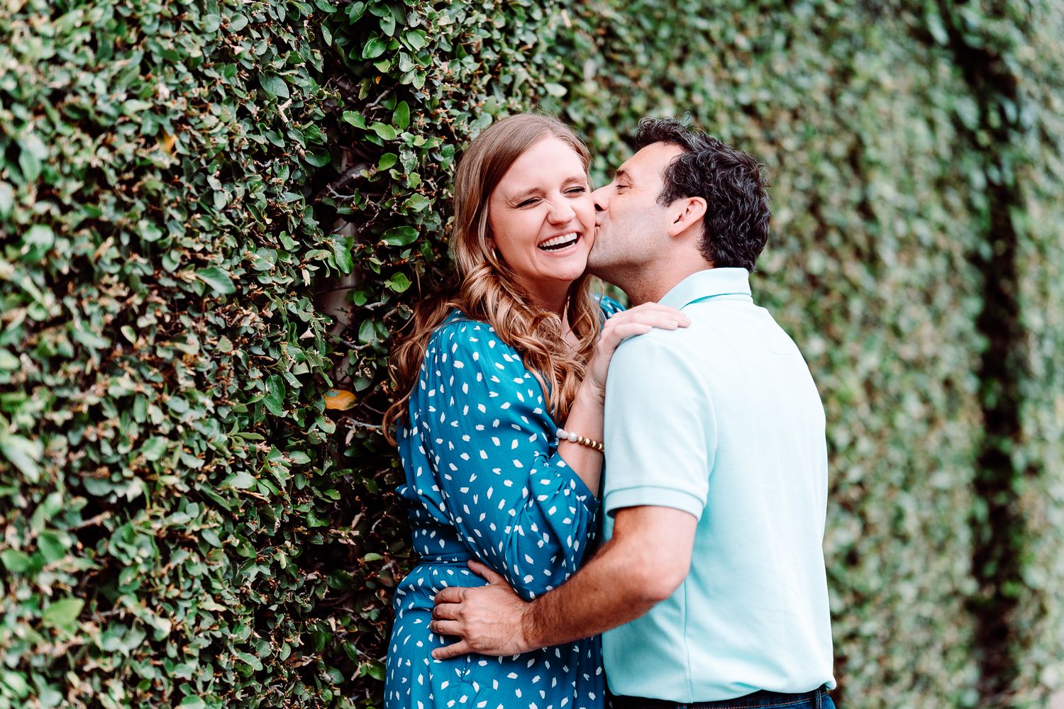 Couple kissing and lauging at the battery in charleston south carolina, photo by PHV Photo