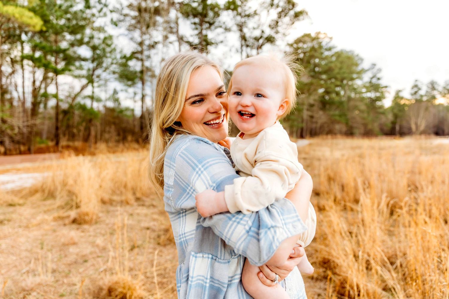 Laughing baby boy in Mother/Son session in field in Hamden, CT