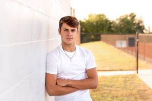 senior session boy sports field