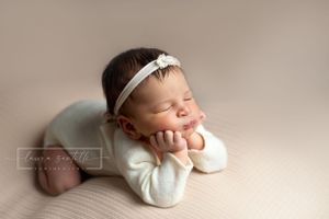newborn chin on hands