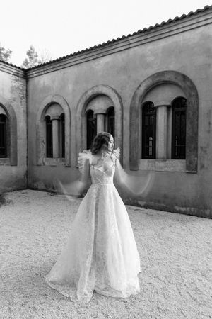 Slow movement capture showing off an ethereal wedding dress.