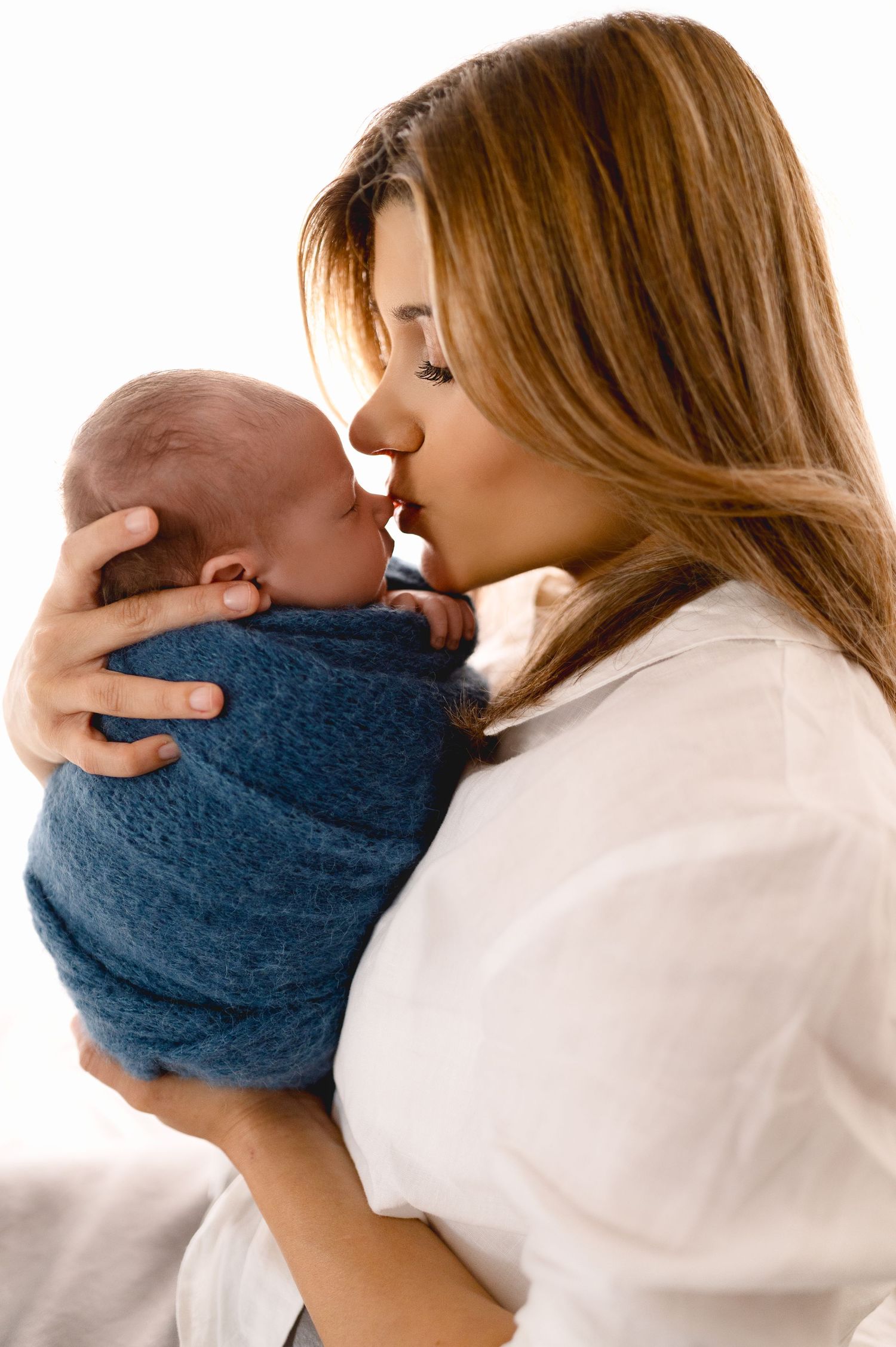 Tender family moments captured in series of gentle embraces.