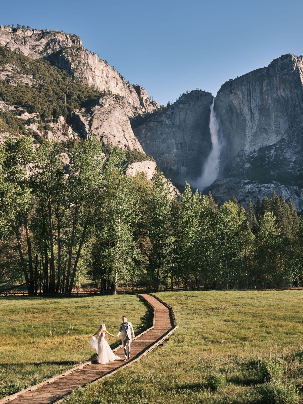 Bride and Groom walking through Yosemite Valley for Wedding