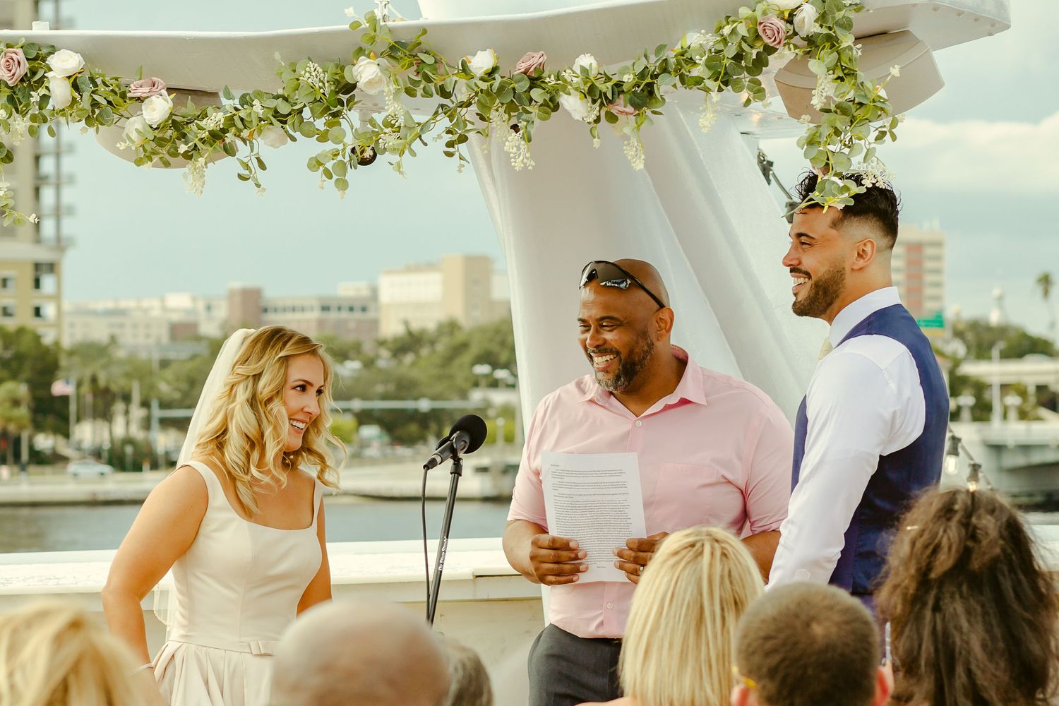 Davon and Rachel's wedding photos as they reading their vows at the Starship in florida in the documentary style photos.