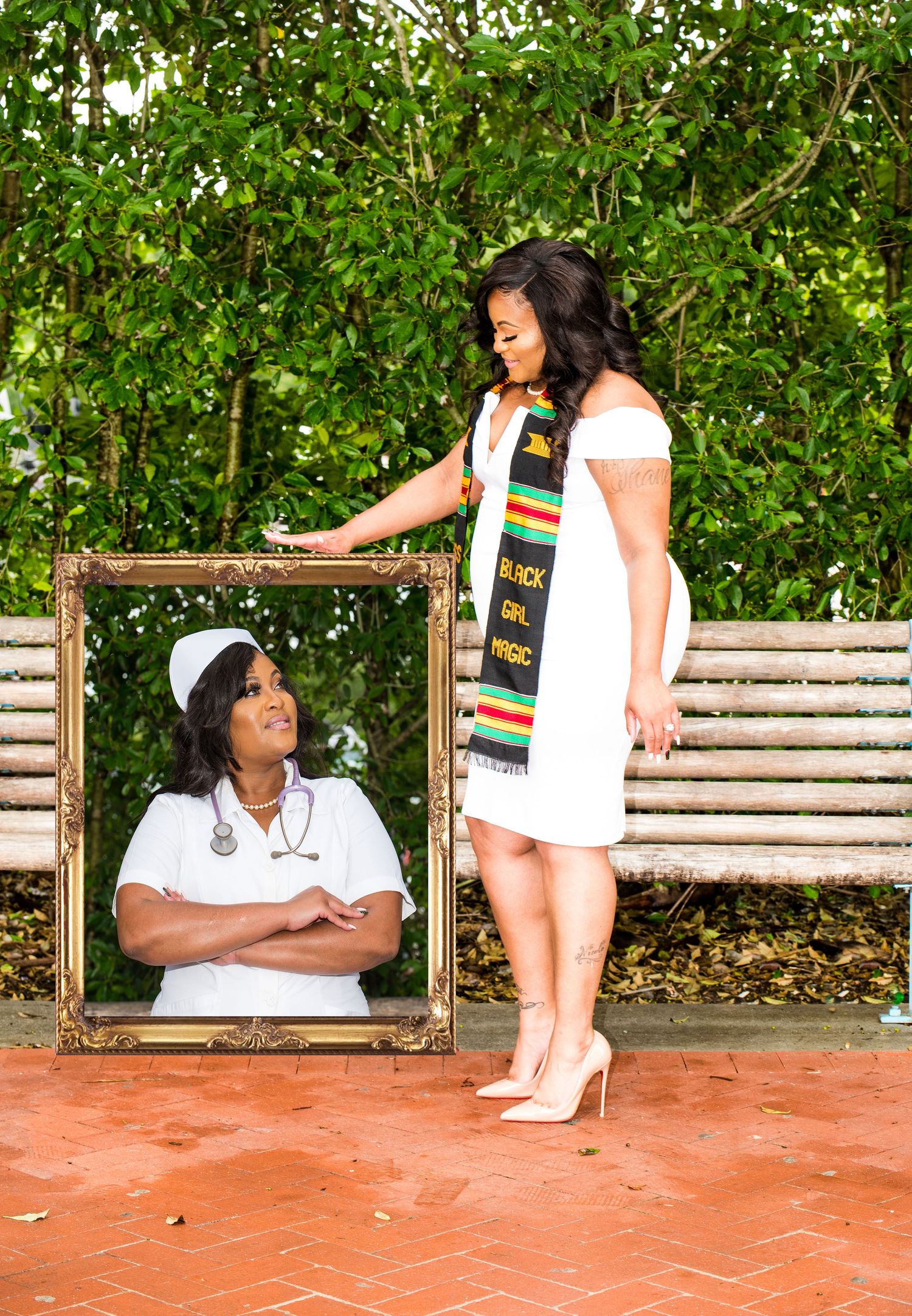 Creative graduation photo with gold frame and decorative stole outdoors.