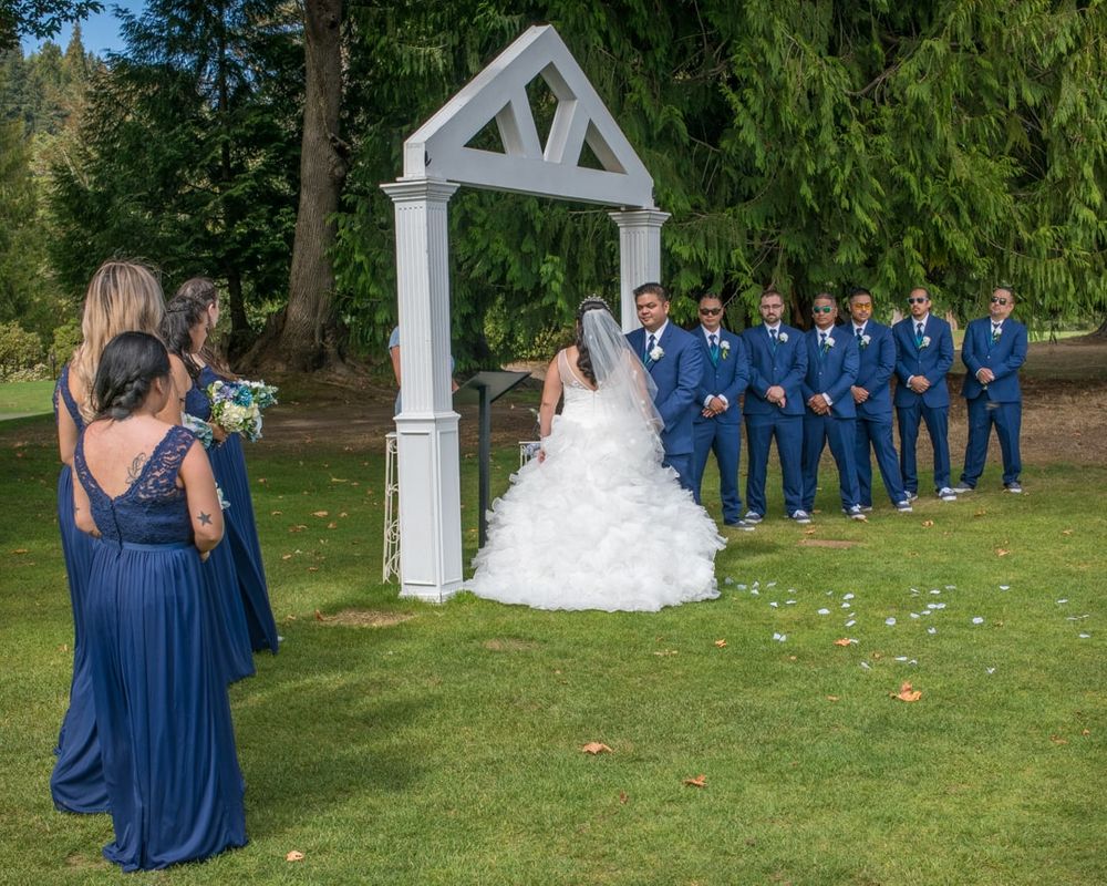 wedding ceremony outside high cedars golf course in Orting, WA